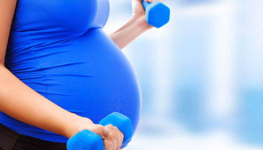 photo-of-pregnant-woman-doing-her-exercise